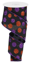 Load image into Gallery viewer, "Wired Halloween ribbon with black background and vibrant glitter polka dots in orange and purple for festive decor."
