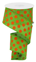 Load image into Gallery viewer, Bright green wired ribbon with orange polka dots, perfect for spring wreaths, crafts, and festive decor projects.
